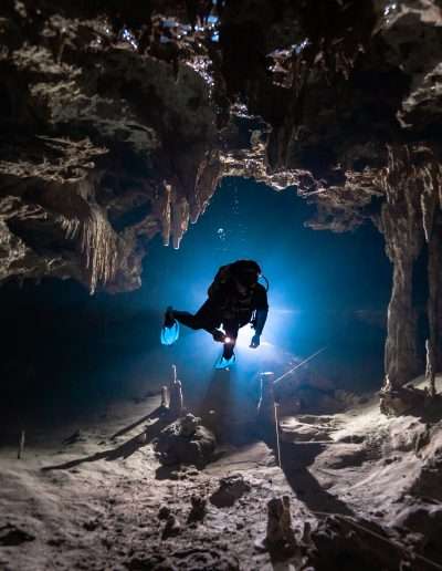Divers exploring Dos Ojos Bat Cave cenote