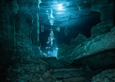 Diver exploring Dos Ojos Bat Cave cenote