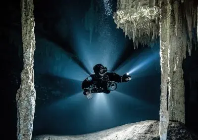 Cave diver exploring Nohoch cenote in the Yucatan